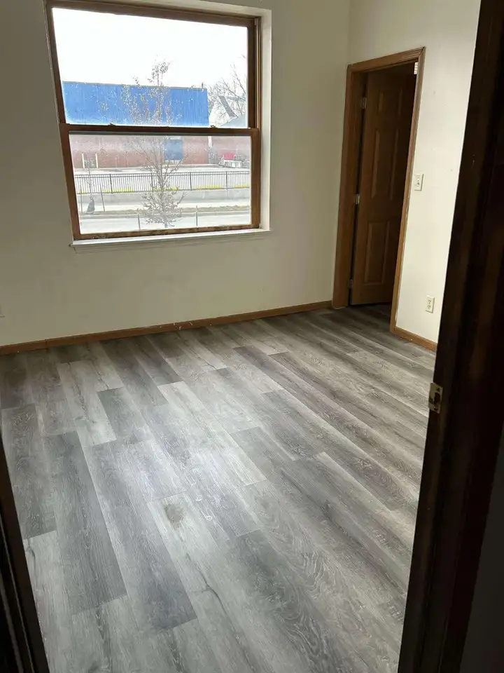 Installed plank flooring in a finished interior room